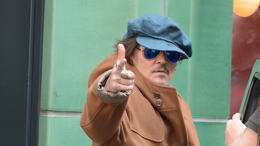 Johnny Depp Amps Up His Tinted Lens Game with Ray-Ban Aviator Large Metal