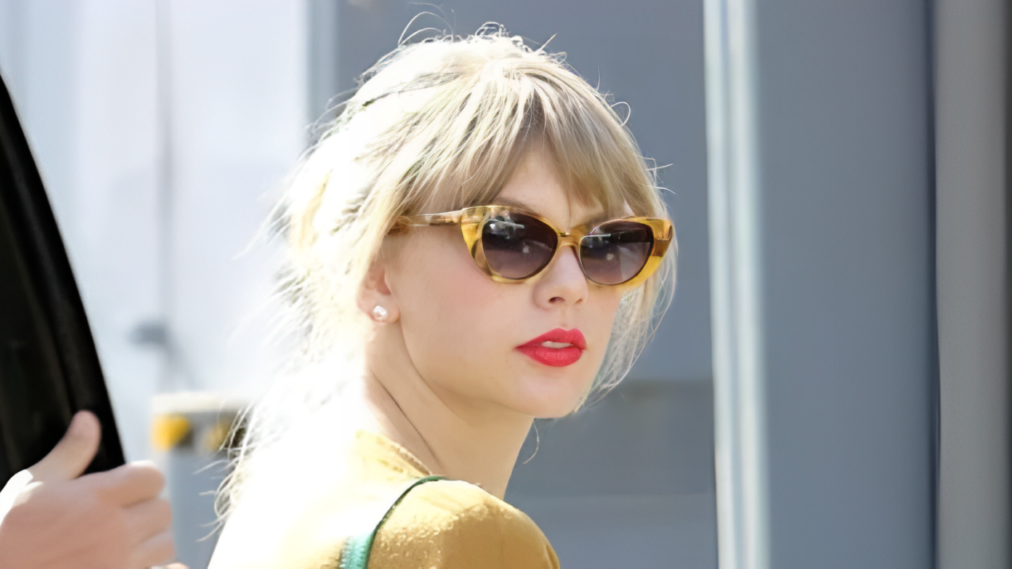 Taylor Swift Radiates Cat-Eye Charm in Elizabeth & James Shades
