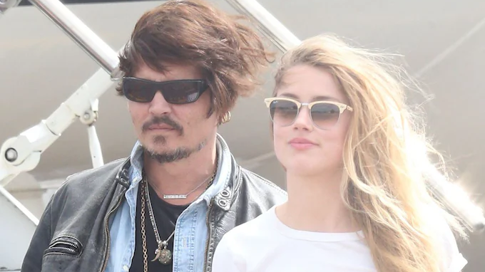 Johnny Depp Makes a Stylish Arrival in Australia Wearing Ray-Ban Sunglasses