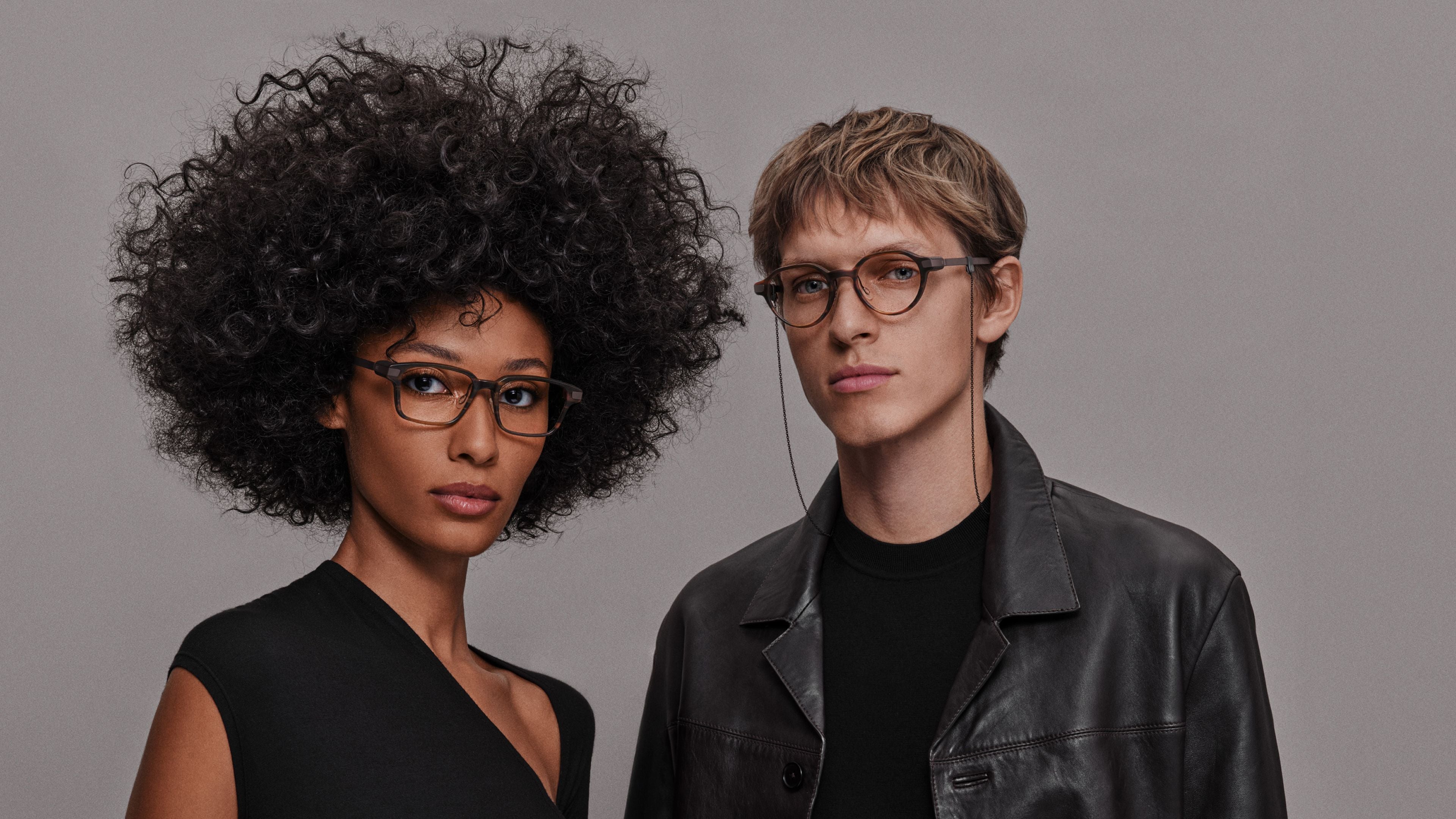 Man and woman in Even G2 Brown 2 smart glasses