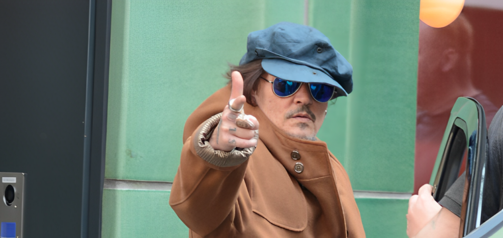 Johnny Depp Amps Up His Tinted Lens Game with Ray-Ban Aviator Large Metal