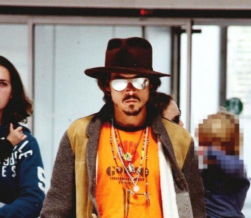 Aviator Elegance: Johnny Depp in Tom Ford at Nice Airport