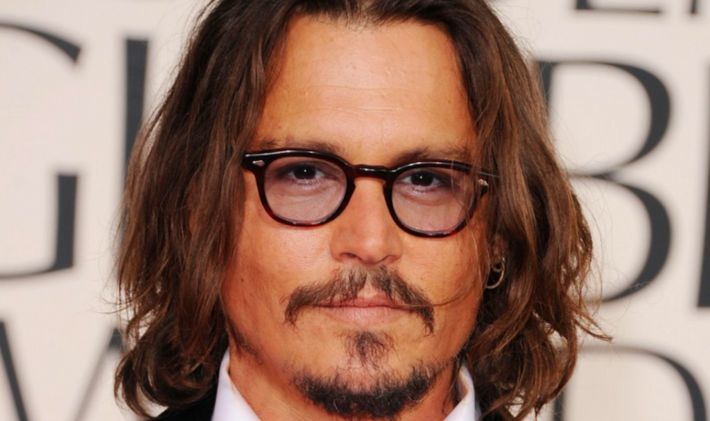 Johnny Depp Shines on Red Carpet in Oliver Peoples Sheldrake