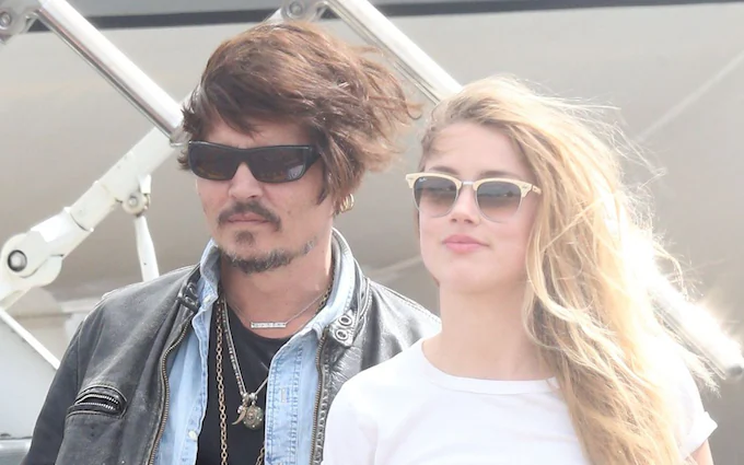 Johnny Depp Makes a Stylish Arrival in Australia Wearing Ray-Ban Sunglasses