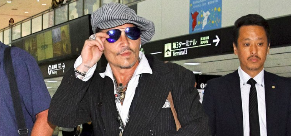 Tokyo Chic: Johnny Depp Lands in Japan Wearing Ray-Ban Aviator Large Metals