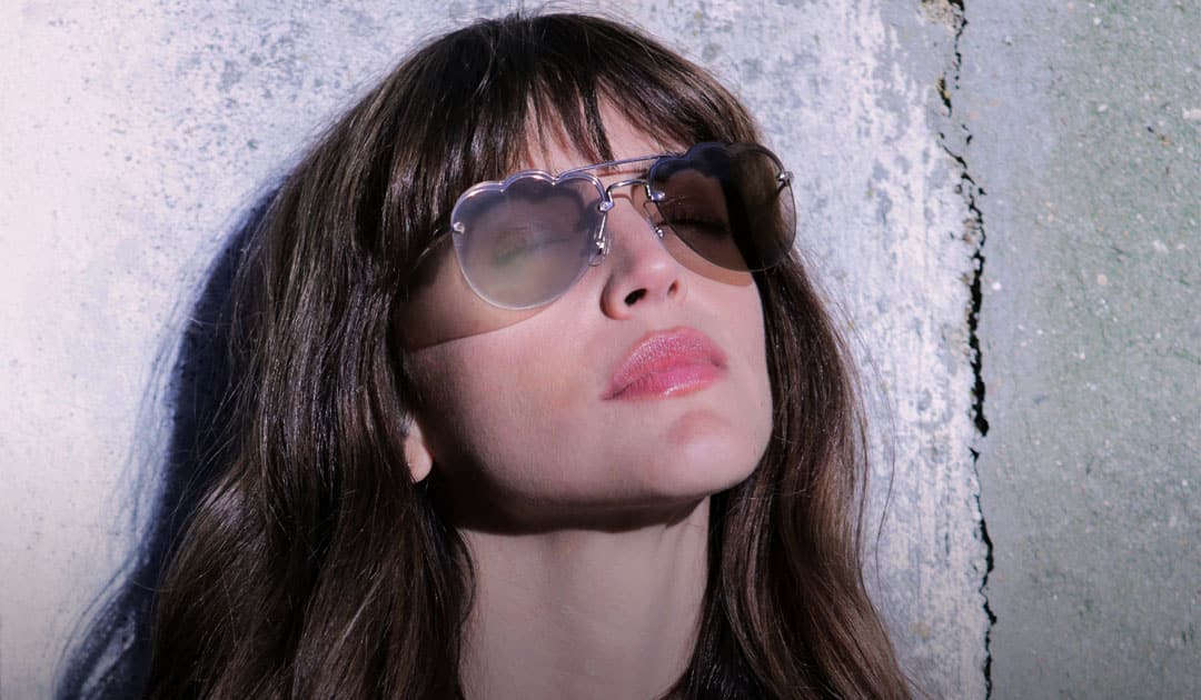 Shade your eyes with Miu Miu sunglasses while your head is in the cloud