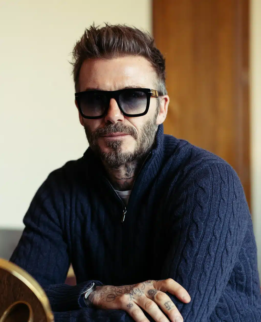 Sportsman and businessman David Beckham in glasses of his own production