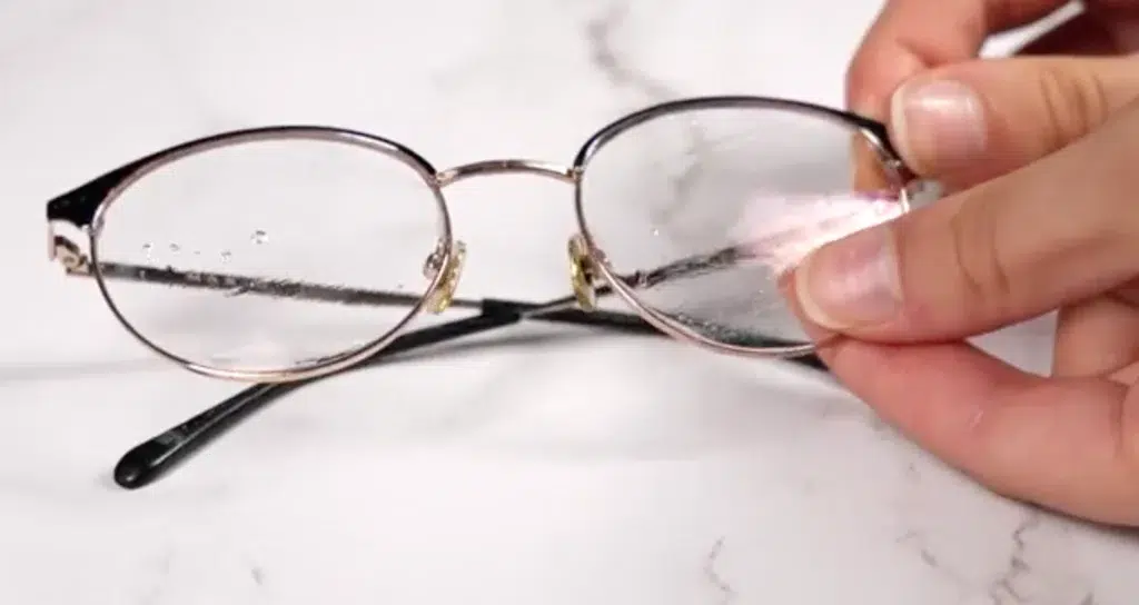 Rubbing lenses with soap