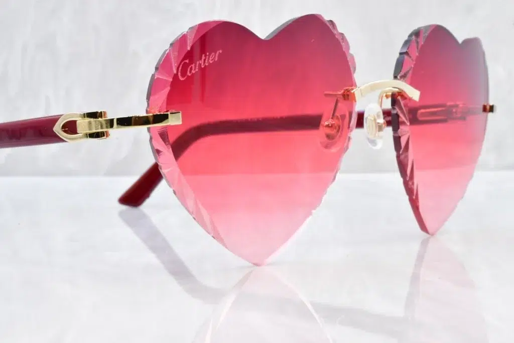 Red heart-shaped glasses by Cartier