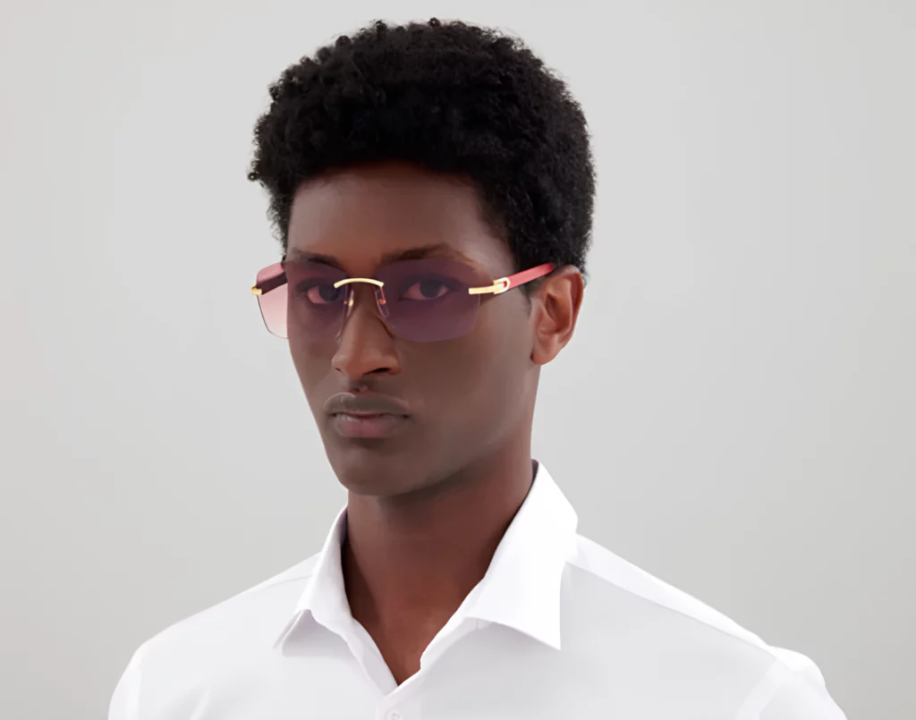 Cartier CT0039RS sunglasses in Gold/Red with Red Multi Treatment finish lenses on model.