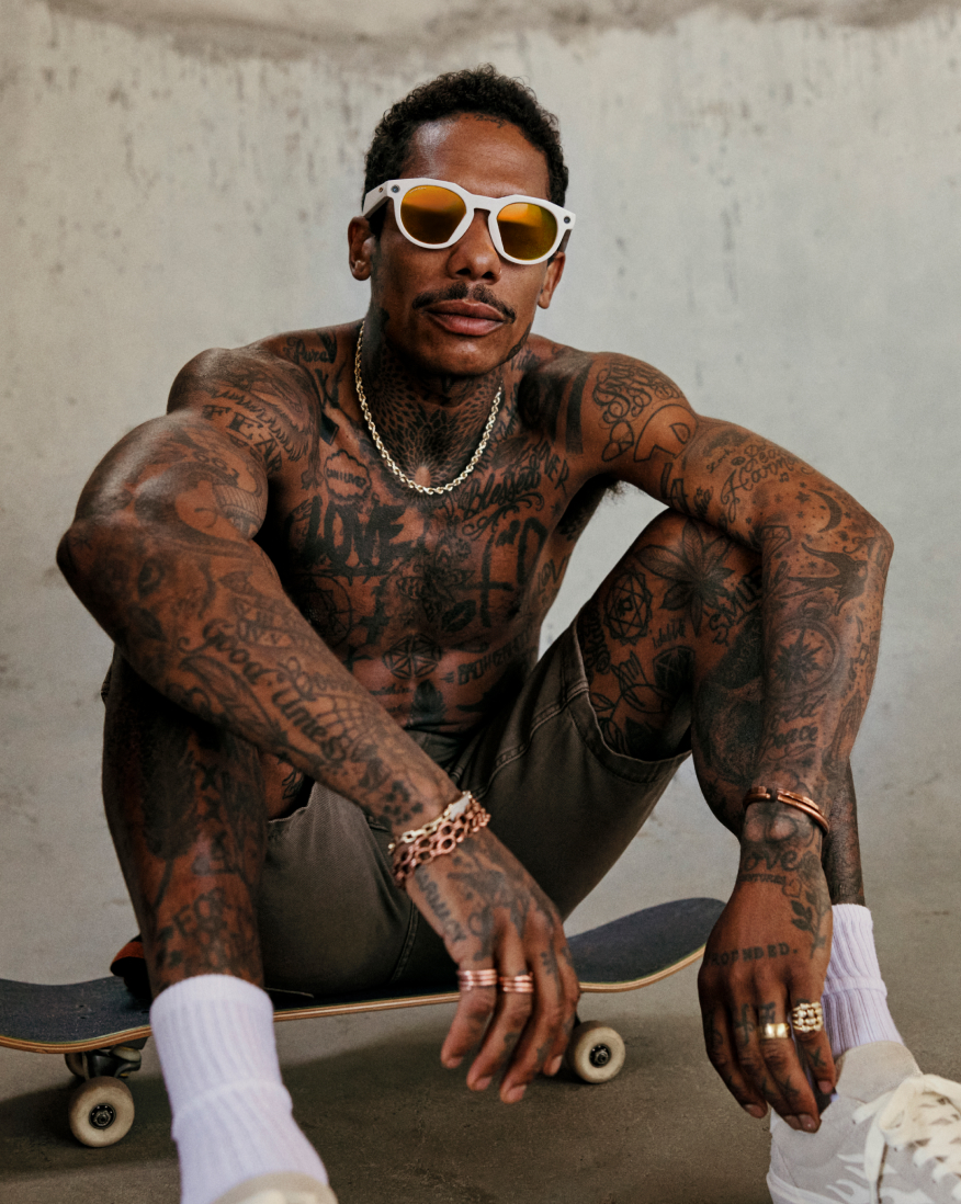 black man in Oakley glasses