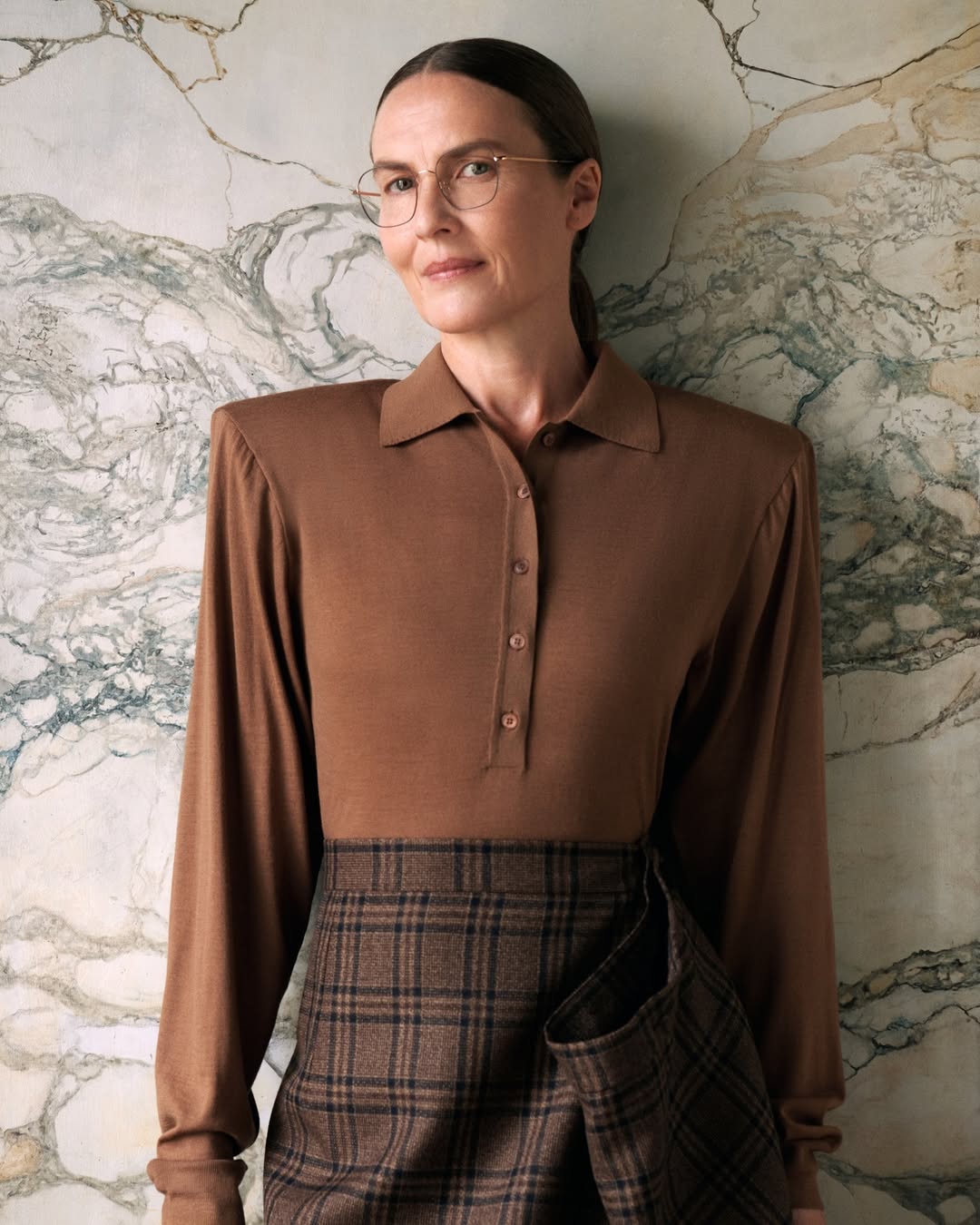 Metal eyeglasses on elder woman