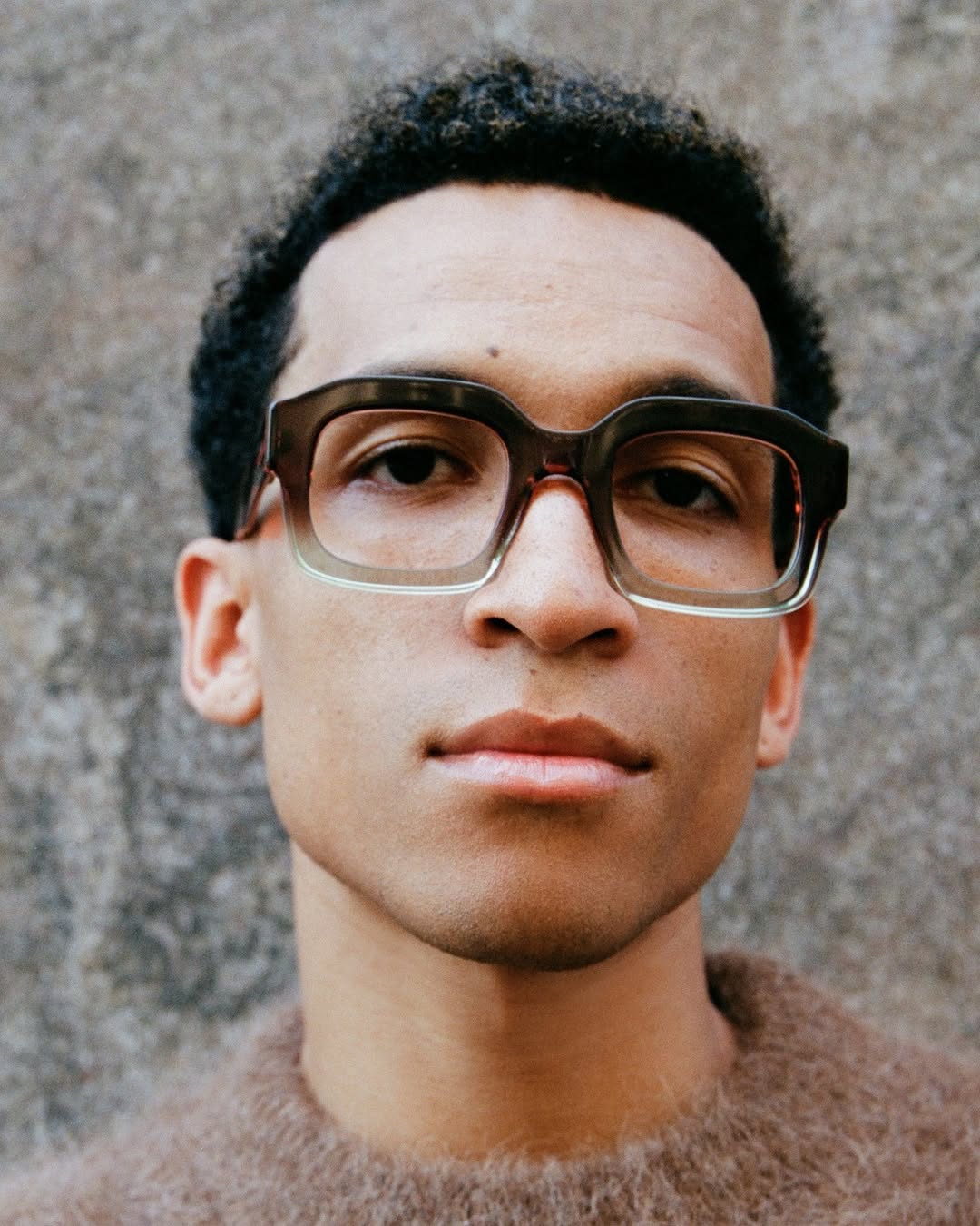 Man in bold optical frames