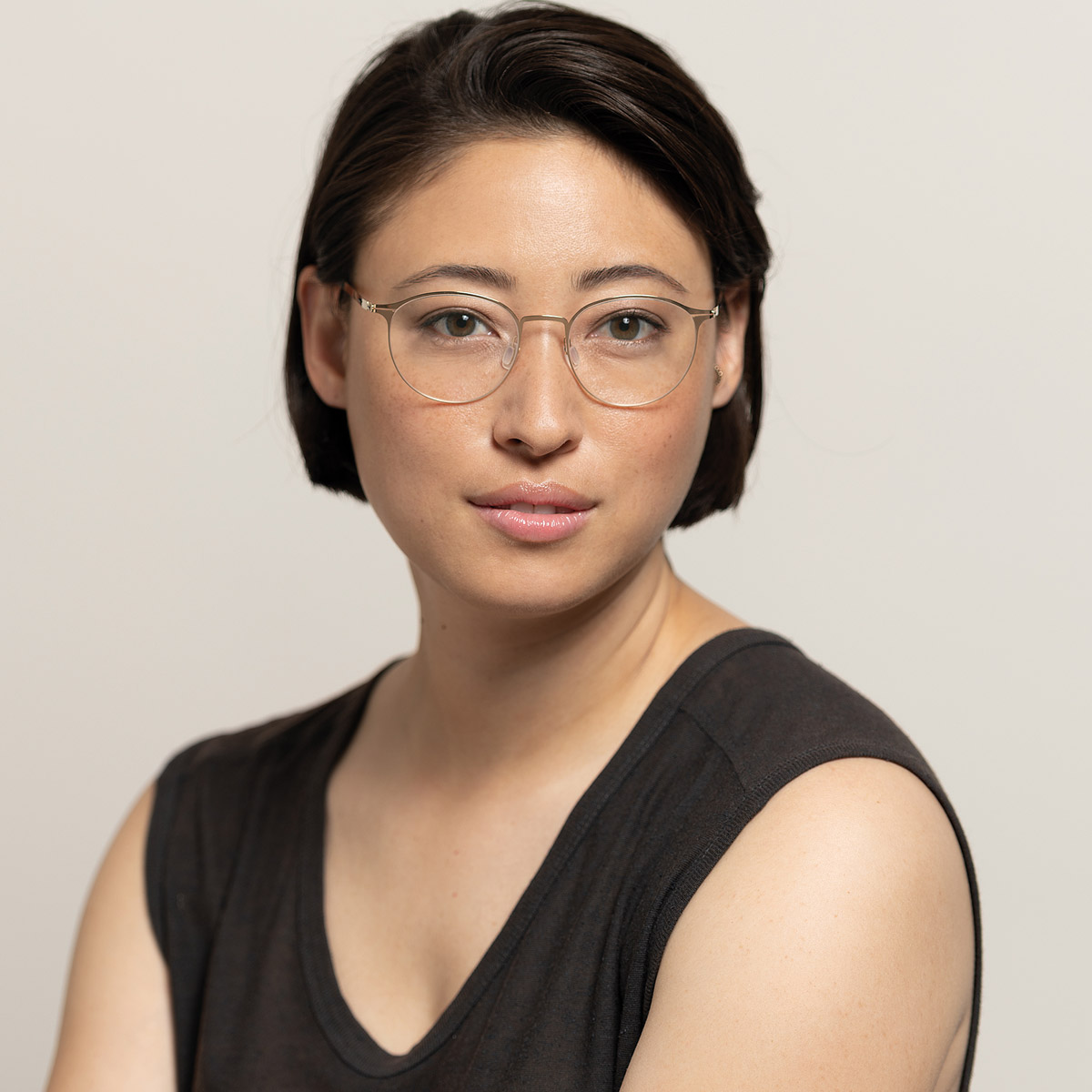 Ic! Berlin Amihan Rosé-Gold Eyeglasses On Female Model