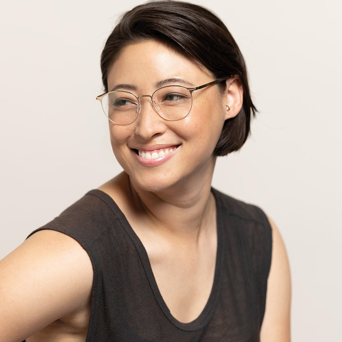 Ic! Berlin Amihan Rosé-Gold Eyeglasses On Female Model 2