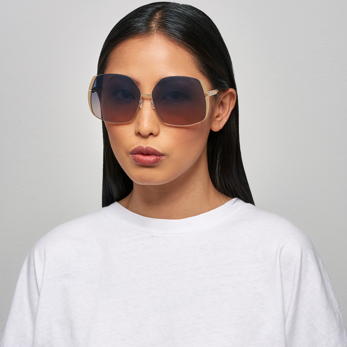 Ic! Berlin MB 06 Rosé-Gold Sunglasses On Female Model
